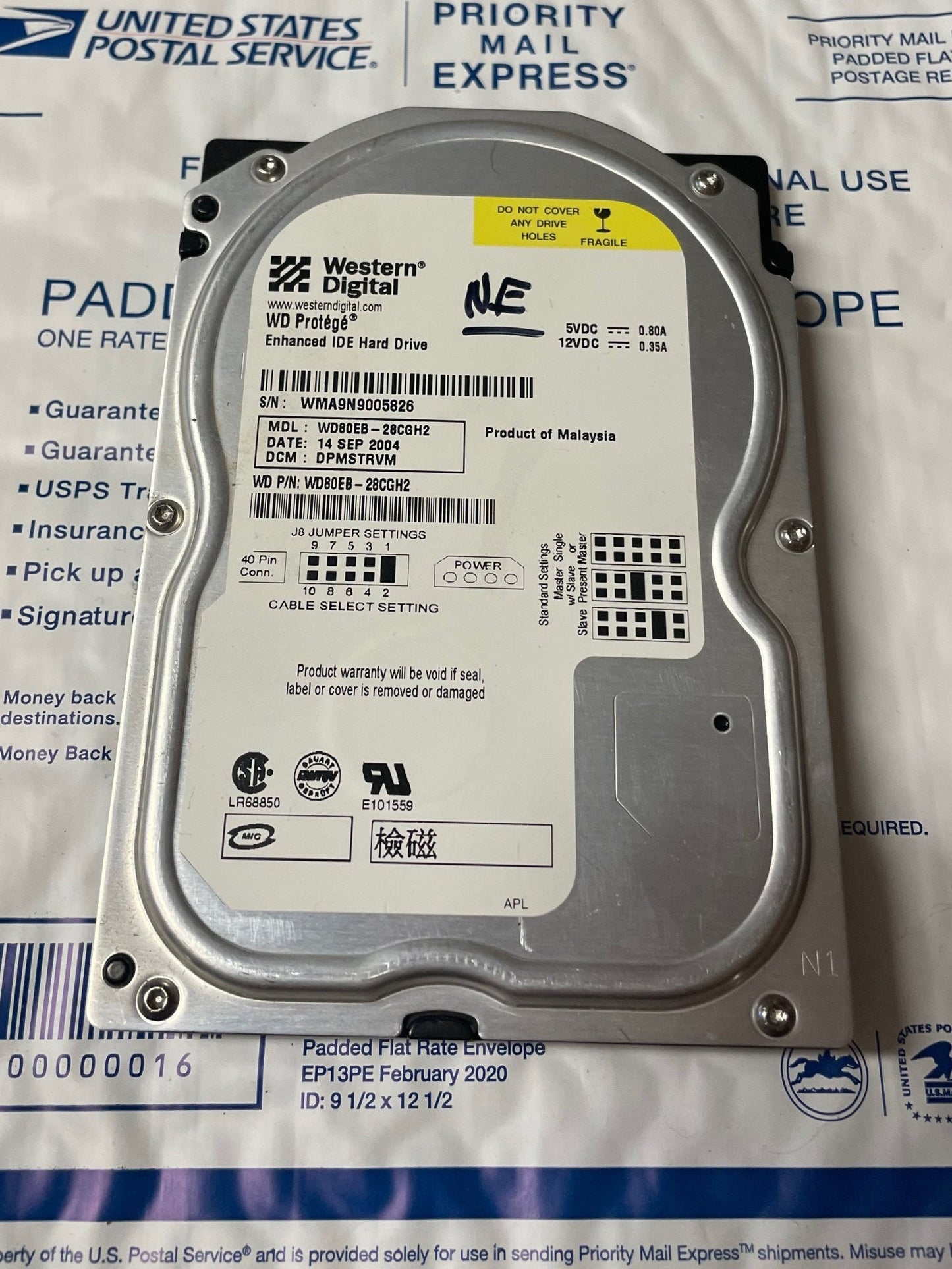 Western Digital WD80EB 8GB Xbox hard drive with factory-nulled EEPROM label and OEM connector